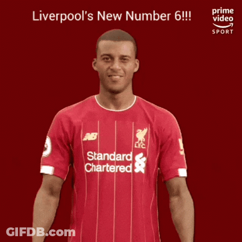 Man In Red Jersey Saying Standard Chartered GIF