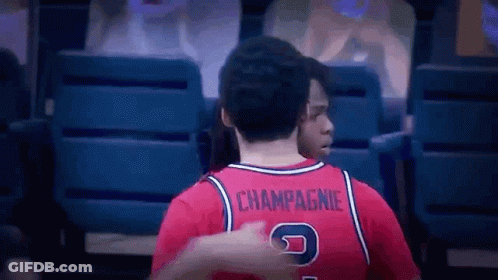 Man In Red Jersey With Champagne On Back GIF