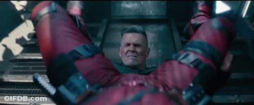 Man In Red Jumpsuit Lying On Back GIF