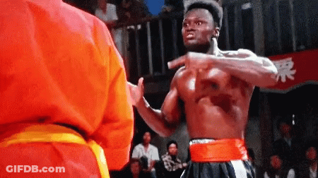 Man In Red Karate Fighting Yellow Belt GIF
