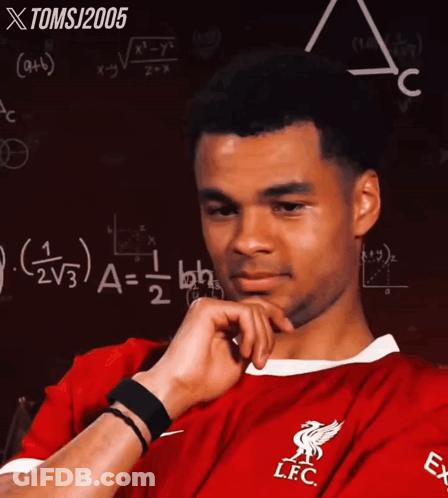 Man In Red LFC Jersey In Front Of Blackboard GIF