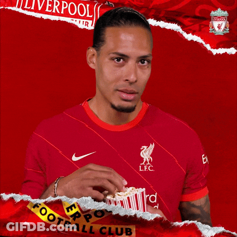 Man In Red Liverpool Jersey Eating Popcorn GIF