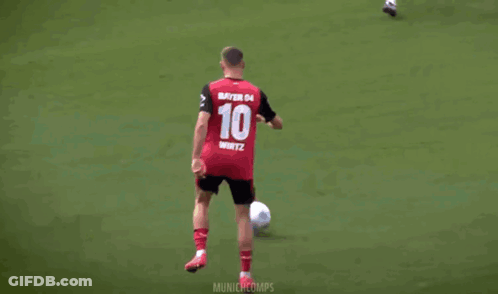 Man In Red Liverpool Jersey Signing Paper GIF