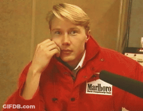 Man In Red Marlboro Jacket Covering Face GIF