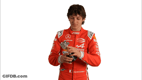 Man In Red Mercedes Racing Suit Holding Key GIF