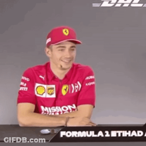 Man In Red Mission Shirt Smiling GIF