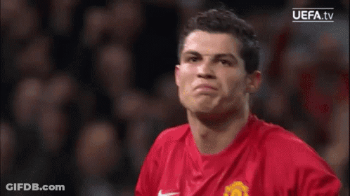 Man In Red Nike Shirt Making Funny Face GIF