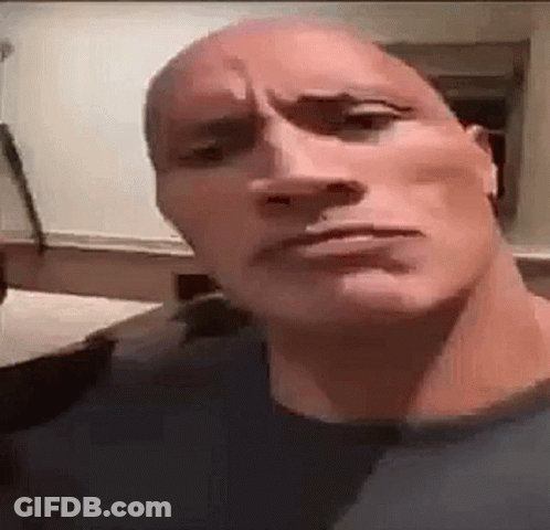 Man In Red Nike Sweatshirt Standing In Front Of Grey Curtain GIF