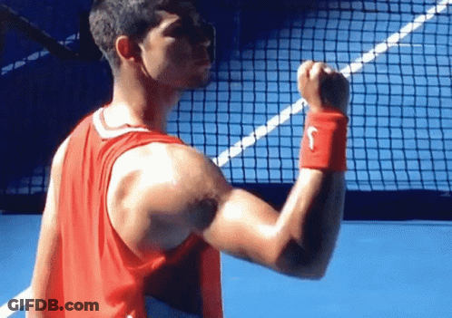 Man In Red Nike Tank Top Flexing GIF