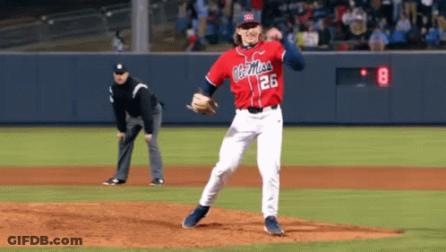 Man In Red Ole Miss Baseball Jersey In Front Of Crowd GIF
