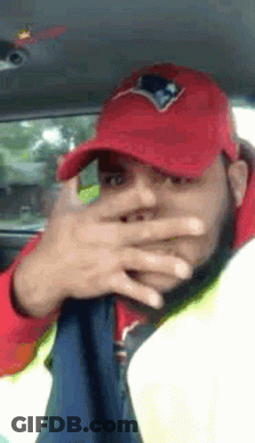 Man In Red Patriots Hat Covering Face GIF