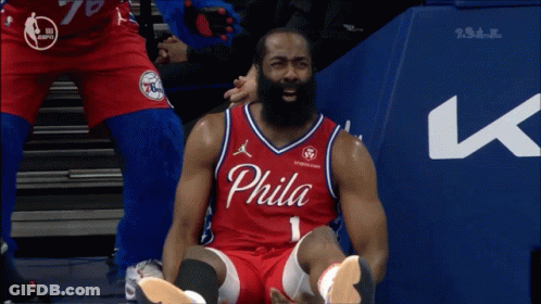 Man In Red Philadelphia Jersey Sitting On Floor GIF
