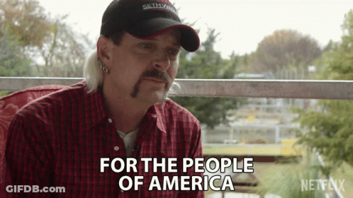 Man In Red Plaid Shirt And Hat Says For The People Of America GIF