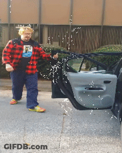 Man In Red Plaid Shirt Standing Next To Car GIF
