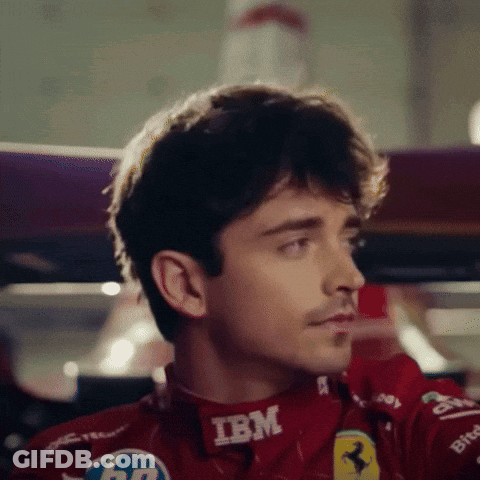 Man In Red Racing Suit IBM Collar GIF