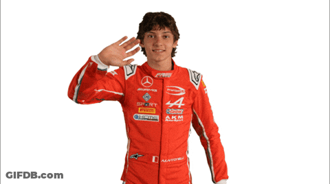 Man In Red Racing Suit With Letters A And M GIF
