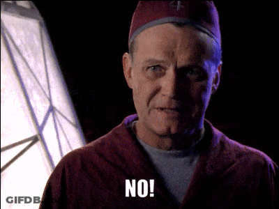 Man In Red Robe And Hat Saying No GIF