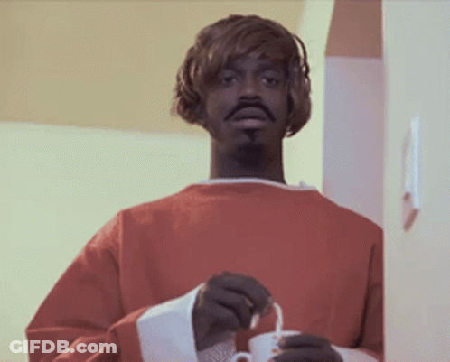 Man In Red Robe Holding White Cup GIF