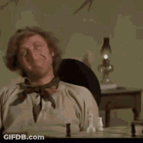 Man In Red Robe Next To Man In Black Robe GIF