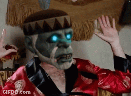 Man In Red Robe With Crown And Blue Eyes GIF