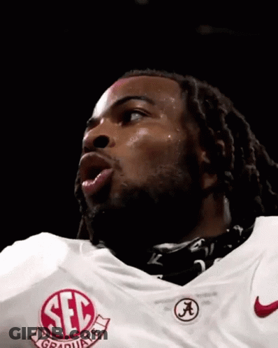 Man In Red SEC Jersey With Falling Confetti GIF