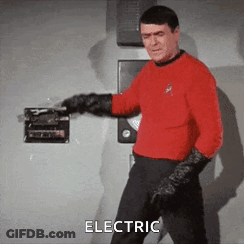 Man In Red Shirt And Black Gloves Says Electric GIF