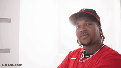 Man In Red Shirt And Black Hat With H GIF