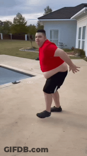 Man In Red Shirt And Black Shorts At Swimming Pool GIF