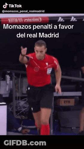 Man In Red Shirt And Black Shorts Pointing At Camera GIF