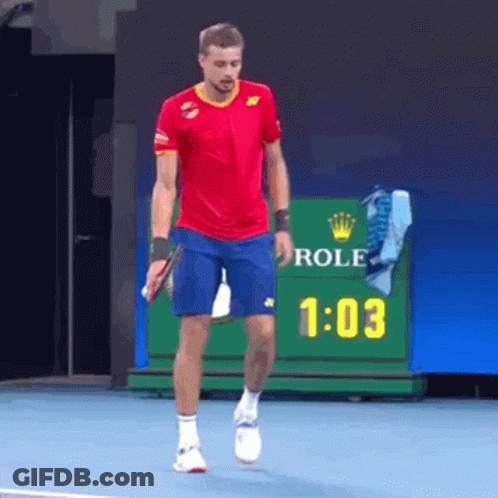 Man In Red Shirt And Blue Shorts With Rolex Sign GIF