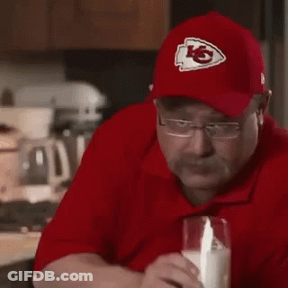 Man In Red Shirt And Hat Drinking Milk GIF