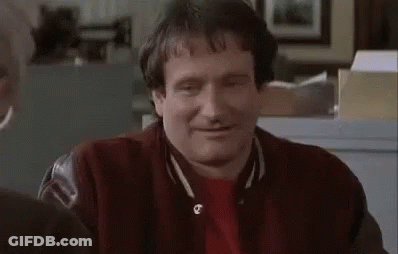 Man In Red Shirt And Jacket Smiling GIF