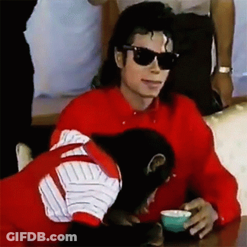 Man In Red Shirt And Sunglasses With Monkey And Coffee GIF