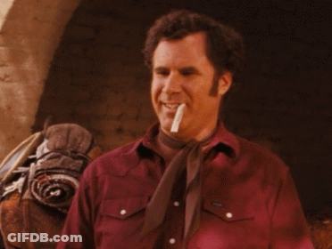 Man In Red Shirt And Tie Smiling With Cigarette GIF