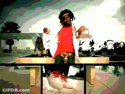 Man In Red Shirt And White Jacket On Table GIF