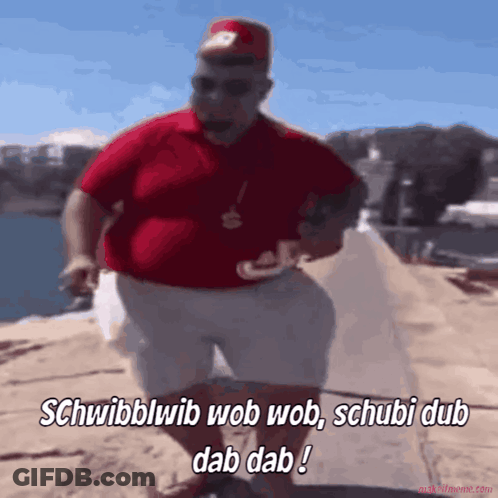Man In Red Shirt And White Shorts Saying Schwibblwib GIF
