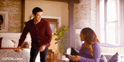 Man In Red Shirt And Woman In Purple Sweater GIF