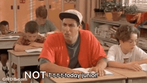 Man In Red Shirt At Desk In Classroom GIF