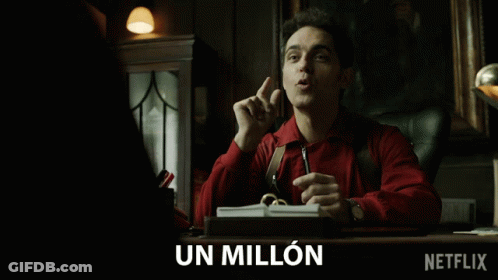 Man In Red Shirt At Desk With Netflix Logo GIF