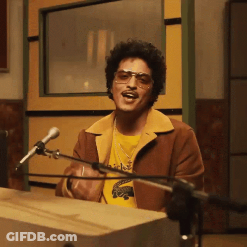 Man In Red Shirt At Microphone GIF