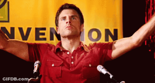 Man In Red Shirt At Microphones GIF