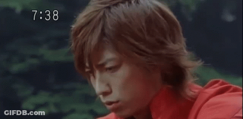 Man In Red Shirt Being Hit In Face With Hammer GIF
