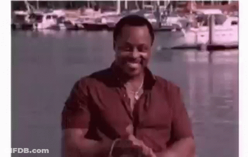 Man In Red Shirt Clapping At Marina GIF