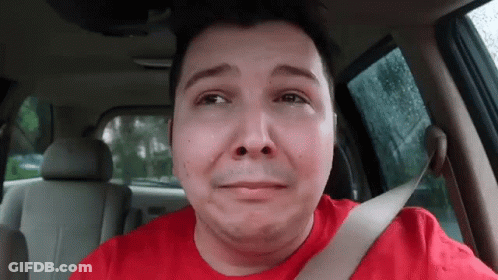 Man In Red Shirt Crying In Back Seat Of Car GIF