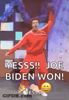 Man In Red Shirt Dancing And Saying Joe Biden Won GIF