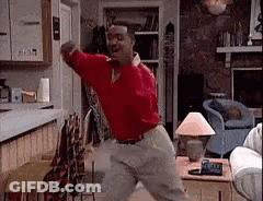 Man In Red Shirt Dancing In Living Room GIF