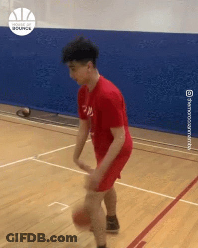 Man In Red Shirt Dribbling Basketball GIF