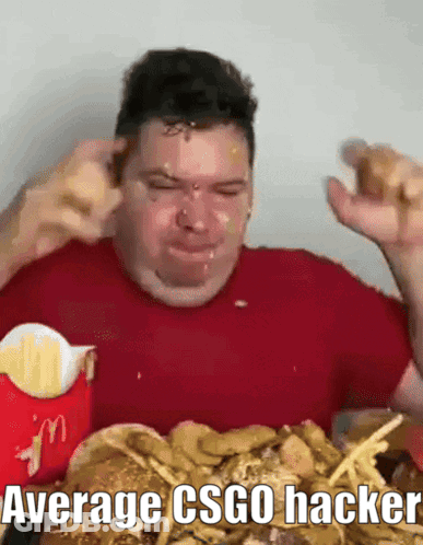 Man In Red Shirt Eating Hamburger Saying Average CSGO Hacker GIF