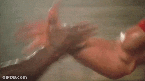 Man In Red Shirt Flexing Muscles GIF