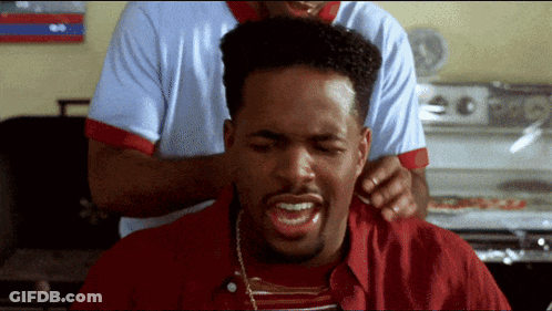 Man In Red Shirt Getting Haircut GIF